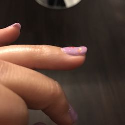 Tu Nhien Beauty Salon - Cool...lop sided nail happening right there...