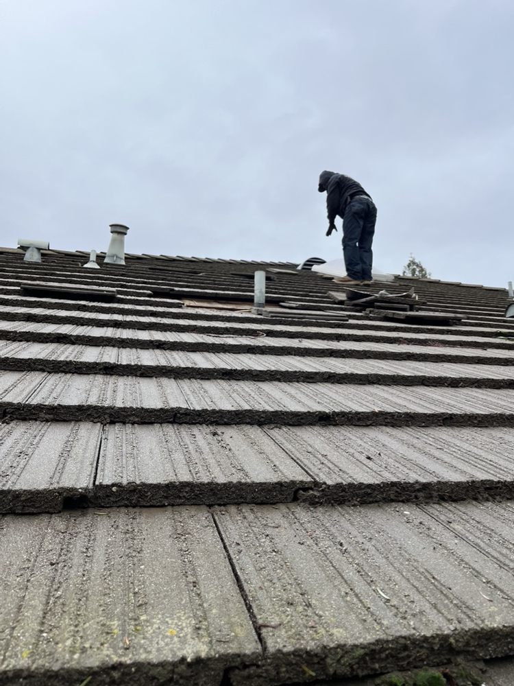 Slide of Mike Rabaino Roofing