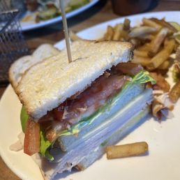 Turkey Club on Artisan bread! So good. Comes with fries! Aaaaaand under $20!! You can't beat that!! Look at all that turkey!!!