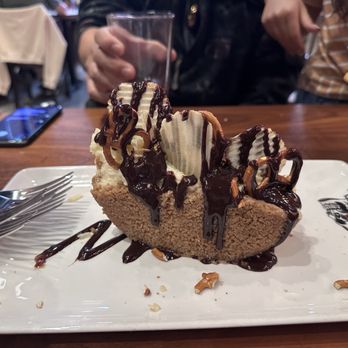 Guy Fieri's Branson Kitchen + Bar - Cheesecake with pretzels and chips. Pretty good to share. - Bars Near Me - Branson, Missouri
