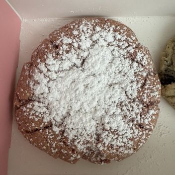 Crumbl - Clairemont - Powdered sugar dump on the strawberry crinkles cookie cookie - Bakeries Near Me - San Diego, California Crumbl - Clairemont - Powdered sugar dump on the strawberry crinkles cookie cookie - Bakeries Near Me - San Diego, California