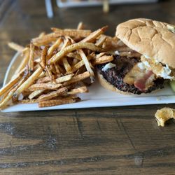 50/50 Taphouse - The Vampire repeller with fries also on a small plate.