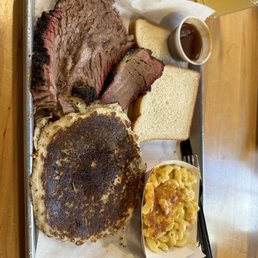 Brisket with hoecake and mac and cheese. Brisket with hoecake and mac and cheese.