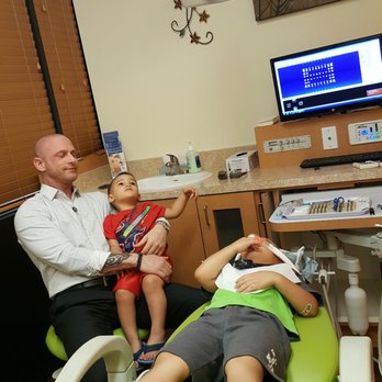 Surprise Pediatric Dentistry - They have TV's on the ceiling for the children to watch as they get their teeth worked on with headphones. - Pediatric Dentists Near Me - Surprise, Arizona Surprise Pediatric Dentistry - They have TV's on the ceiling for the children to watch as they get their teeth worked on with headphones. - Pediatric Dentists Near Me - Surprise, Arizona