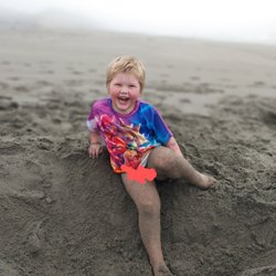 Jot's Resort - My son's first time in the sand...his fave says it all