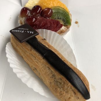 MA-France - Chocolate filled eclair and fruit tart. - French Near Me - Lexington, Massachusetts MA-France - Chocolate filled eclair and fruit tart. - French Near Me - Lexington, Massachusetts