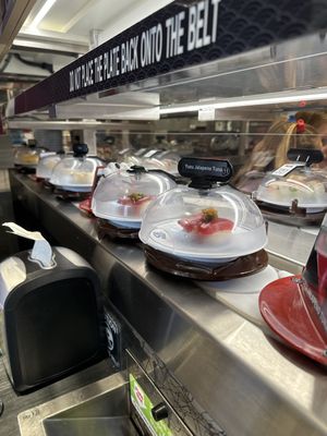 Kura Revolving Sushi Bar by null