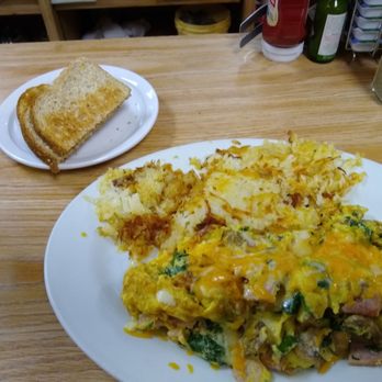 Hometown Cafe - Suzie's Favorite Omelette with hash browns and wheat toast.  Includes ham, mushrooms, spinach and cheese. - Breakfast & Brunch Near Me - Reno, Nevada