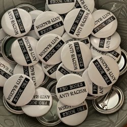 Adventure Bound Books - PRO BOOKS, ANTI-RACISM buttons. $1 from the sell of each button goes to CREED-NC.