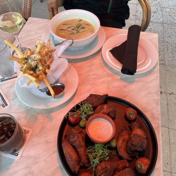 Cassis St. Pete - Smoked buffalo chicken wings- truffle fries- asparagus soup - New American Near Me - St Petersburg, Florida Cassis St. Pete - Smoked buffalo chicken wings- truffle fries- asparagus soup - New American Near Me - St Petersburg, Florida
