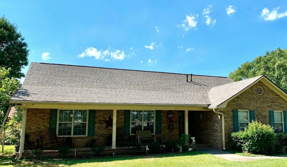 Slide of Gunn Roofing