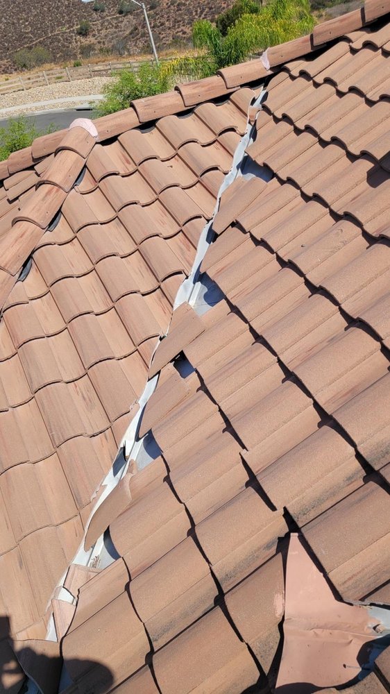 Slide of Lopez Roofing