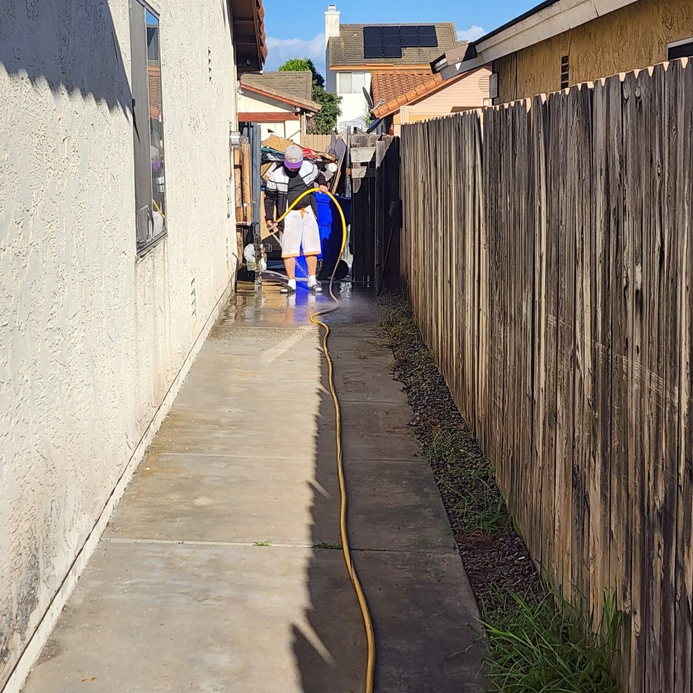 Just Move It - Popz washing the clear sideyard - Movers Near Me - San Diego, California Just Move It - Popz washing the clear sideyard - Movers Near Me - San Diego, California
