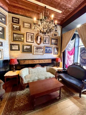Photo of NoRA Cupcake Company - Middletown, CT, US. Comfy seating and cool chandelier