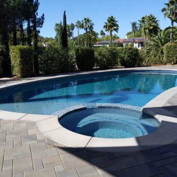 Capstone Pool & Spa Remodeling - Refinished with pebble, new glass tile and coping - Pool & Hot Tub Service Near Me Capstone Pool & Spa Remodeling - Refinished with pebble, new glass tile and coping - Pool & Hot Tub Service Near Me