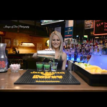 Duke's Tavern - a woman pouring a drink - Bars Near Me - Katy, Texas Duke's Tavern - a woman pouring a drink - Bars Near Me - Katy, Texas
