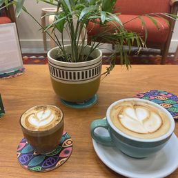 Cortado (left) and oat milk latte with gochujang brown butter syrup (right) Cortado (left) and oat milk latte with gochujang brown butter syrup (right)