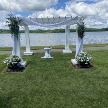 Studio Wilde Floral - sprays for pergola (we provided the chiffon and the venue provided the filled planters at the base) - Floral Designers Near Me Studio Wilde Floral - sprays for pergola (we provided the chiffon and the venue provided the filled planters at the base) - Floral Designers Near Me