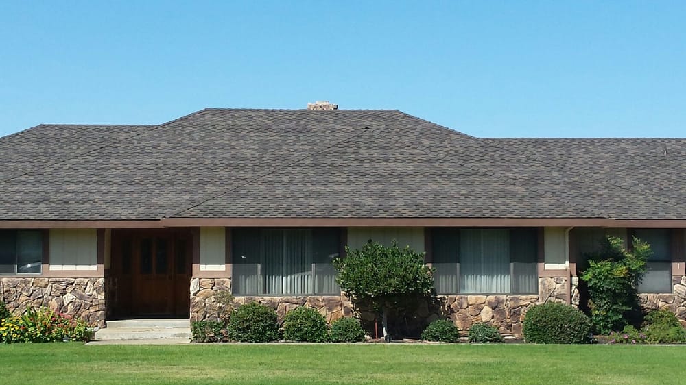 Slide of R Mcguire Roofing Co