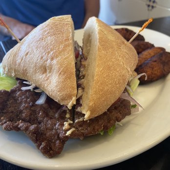 Limeña Peruvian Eatery - MILANESA DE CARNE $13.50 Breaded Angus Beef with lettuce, tomato, and onion on ciabatta - Peruvian Near Me - Thousand Oaks, California Limeña Peruvian Eatery - MILANESA DE CARNE $13.50 Breaded Angus Beef with lettuce, tomato, and onion on ciabatta - Peruvian Near Me - Thousand Oaks, California