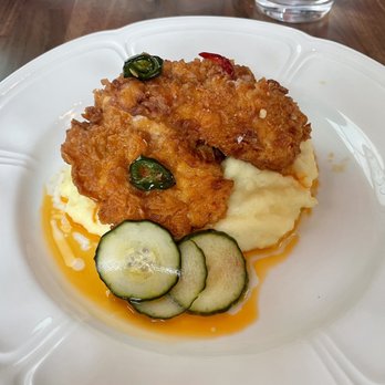 Restaurant Claudine - Hot fried chicken over mashed potatoes - French Near Me - San Antonio, Texas Restaurant Claudine - Hot fried chicken over mashed potatoes - French Near Me - San Antonio, Texas