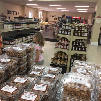 We're Nuts - a little girl in a grocery store - Farmers Market Near Me - Vienna, Georgia