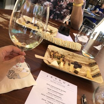 Jessup Cellars - Wine and cheese pairing with crackers, mixed nuts, and chocolate - Wine Tasting Room Near Me - Yountville, California