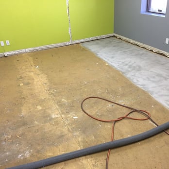 Flooring Professionals - Removing old carpet adhesive in a business using the DustRam system. - Flooring Near Me Flooring Professionals - Removing old carpet adhesive in a business using the DustRam system. - Flooring Near Me