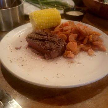 Rustler's Rooste - I should have taken a picture before we started eating. This was our leftovers after 2 grown adults ate. - Steakhouses Near Me - Phoenix, Arizona