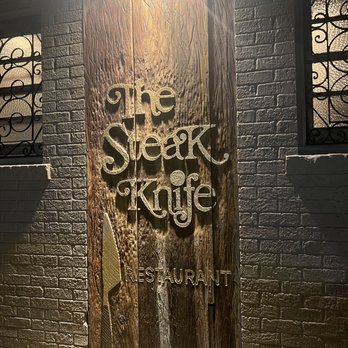 Steak Knife Restaurant - a sign on a door - Steakhouses Near Me - New Orleans, Louisiana Steak Knife Restaurant - a sign on a door - Steakhouses Near Me - New Orleans, Louisiana