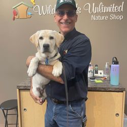Wild Birds Unlimited - Wild Birds Unlimited Arlington Heights and Glenview, IL owner Ron Zick with Canine Companions Future Service Dog Kurby.