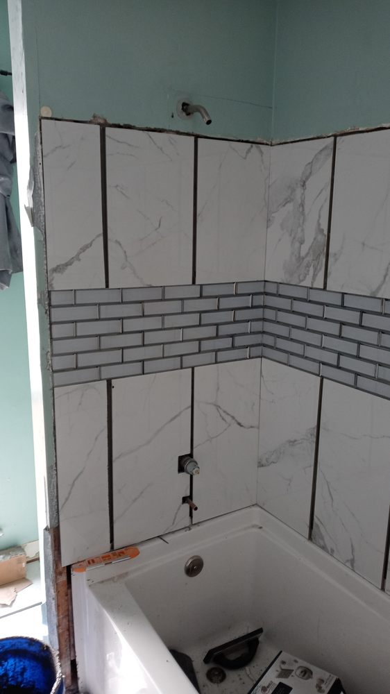 Slide of Reeds Home Improvement Service's