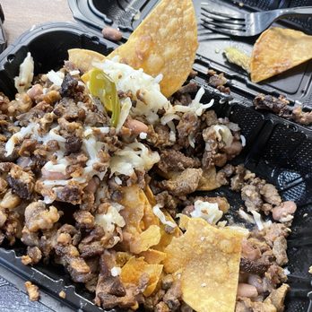 Papi’s Tacos - Horrible nachos. Dry beef, unmelted cheese, dry beans... only flavor came from the salt on the chips. - Tacos Near Me - Torrance, California
