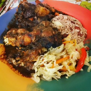 Jamaican Jerk Pit - Jerk Chicken & Oxtail Combo Plate with house-blend of sauteed vegetables and rice and peas - Caribbean Near Me - Ann Arbor, Michigan Jamaican Jerk Pit - Jerk Chicken & Oxtail Combo Plate with house-blend of sauteed vegetables and rice and peas - Caribbean Near Me - Ann Arbor, Michigan
