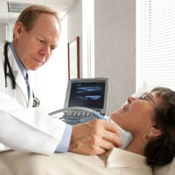 Revati Wellness - Dr. Tom performing a CIMT - an ultrasound of the carotid artery