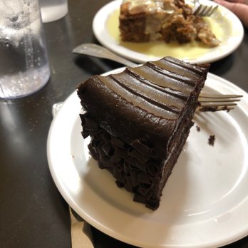 Mom's Diner - Triple layer fudge cake and bread pudding with brandy sauce - Diners Near Me - Pahrump, Nevada Mom's Diner - Triple layer fudge cake and bread pudding with brandy sauce - Diners Near Me - Pahrump, Nevada