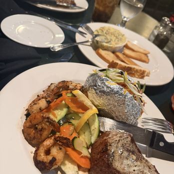 Table 59 - Sirloin & Shrimp Combo with baked potato - Italian Near Me - Merced, California Table 59 - Sirloin & Shrimp Combo with baked potato - Italian Near Me - Merced, California