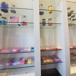 Shelves with a wide variety of add ins for slime
