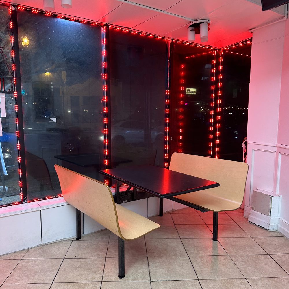 Aladdin's Kitchen - a table and chairs in front of a window - Halal Near Me - Washington, DC, District of Columbia Aladdin's Kitchen - a table and chairs in front of a window - Halal Near Me - Washington, DC, District of Columbia