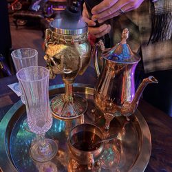 Elixir Tea Bar - Here the Owner was pouring me a Holy Grail Tea! The honey was delicious