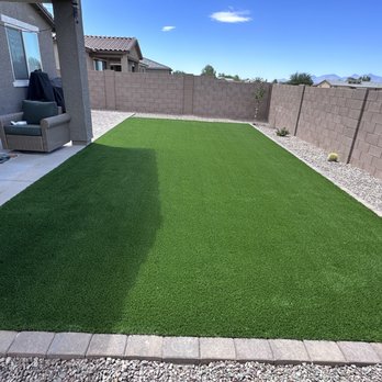 Scorpion Landscapers - a backyard with artificial grass - Landscaping Near Me Scorpion Landscapers - a backyard with artificial grass - Landscaping Near Me