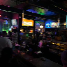 people sitting at a bar people sitting at a bar