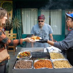 Paulina's Catering - Service of tacos for happy customers