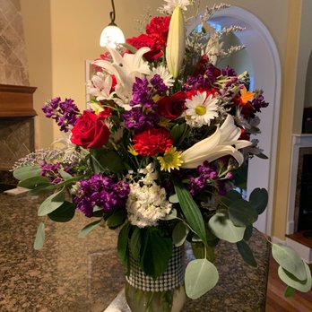 Sherwood Florist - Details everywhere with subtle sprayed glitter and a little butterfly too - Florists Near Me - Spring Hill, Florida