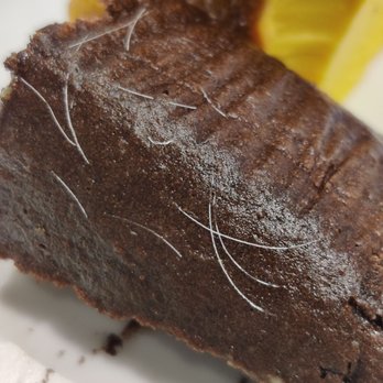 Numero Uno Market - Picked up ChocoFlan cake the other day. Saw this today. Not sure what it is. Doesnt look like hair but whatever it is, it shouldn't be there - Grocery Near Me - El Monte, California Numero Uno Market - Picked up ChocoFlan cake the other day. Saw this today. Not sure what it is. Doesnt look like hair but whatever it is, it shouldn't be there - Grocery Near Me - El Monte, California