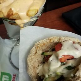 Falafel on brown bread and fries with spicy mayo Falafel on brown bread and fries with spicy mayo