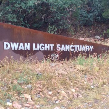 Dwan Light Sanctuary - Beyond their sign you begin your walk up the hill to the Sanctuary. - Arts & Entertainment Near Me - Las Vegas, New Mexico