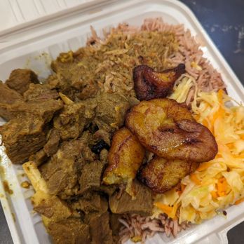 Chris Jerk - Curry goat meal, $16.20. Sept 2024 - Caribbean Near Me - Markham, Ontario