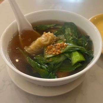 Kin'd - S3. Wonton Soup- delish wantons light and soft, fresh greens, roasted garlic on top - Thai Near Me - Fresh Meadows, New York