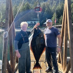 Steamboat Bay Fishing Club - King Russell helps us land 93 pounder!